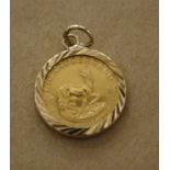 A 9ct gold mounted 1/10 Krugerrand coin pendant,   dated 1981