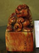 A Chinese soapstone seal  , Dog of Fo, 9.5cm high
