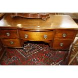 An Edwardian mahogany dressing table   122cm wide and   A Georgian snap top oak tripod table   73cm