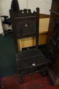 A Charles II oak back stool