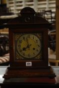 An Edwardian oak mantel clock,   40cm x 29cm