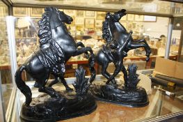 A pair of spelter rearing horses  , 45cm high (af)