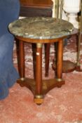 An Empire style mahogany and marble mounted circular table   on turned supports