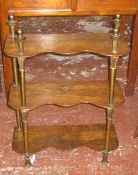 A set of three gilt metal and oak hanging shelves   19th Century, with serpentine shelves, joined