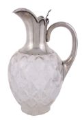 A Victorian claret jug   with silver spout and handle. 20.5cm high. (small chips to base)