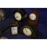 An Asprey clock  , a mantle time piece in hammered case, an oak mantel clock Mappin and Webb and