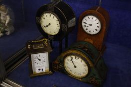 An Asprey clock  , a mantle time piece in hammered case, an oak mantel clock Mappin and Webb and