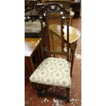 A late 17th walnut high back chair   with carved crest rail with cane panel back, upholstered stuff