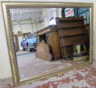A gold framed hall mirror   with bevelled plate. 138cm x 108cm.