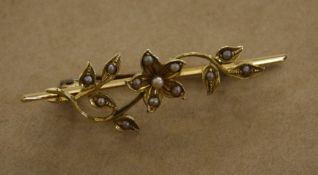 A 15ct gold seed pearl bar brooch  , floral decorated
