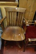 An early 20th Century oak desk chair   and a late Victorian piano stool