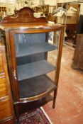 An Edwardian mahogany bow front cabinet   65cm wide