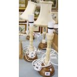 Two pairs of modern table lamps,   decorated with Oriental figures, on circular wooden bases, (two