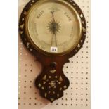 A 19th Century mother of pearl inlaid wheel barometer  , 104cm