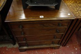 A George III style mahogany chest   with a brushing slide and four long drawers 67cm wide