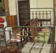 A green painted iron and brass mounted bedstead