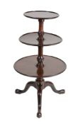 A George III mahogany dumb waiter  , circa 1780, with three graduated tiers with moulded edge