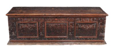 An Italian cedar and pokerwork decorated cassone  , second half 17th century, the hinged lid