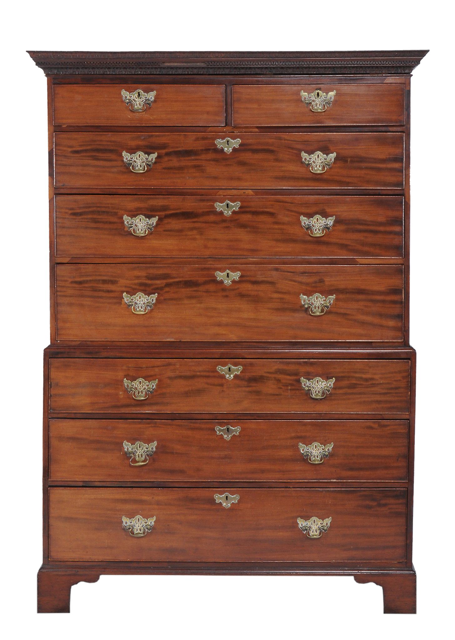 A George III mahogany chest-on-chest,   circa 1780, the carved scroll, dentil, and accanthus