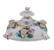 A Meissen model of a flower-encrusted scent bottle annd stopper   A Meissen model of a flower-