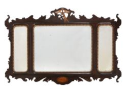 A mahogany and parcel gilt walll mirror in George II style, 20th century,   the triple bevelled