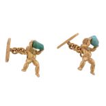 A pair of putti cufflinks  , the putti shaped terminals each holding a piece of turquoise, with