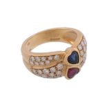 A ruby, sapphire and diamond ring,   centrally set with a heart shaped ruby and a heart shaped