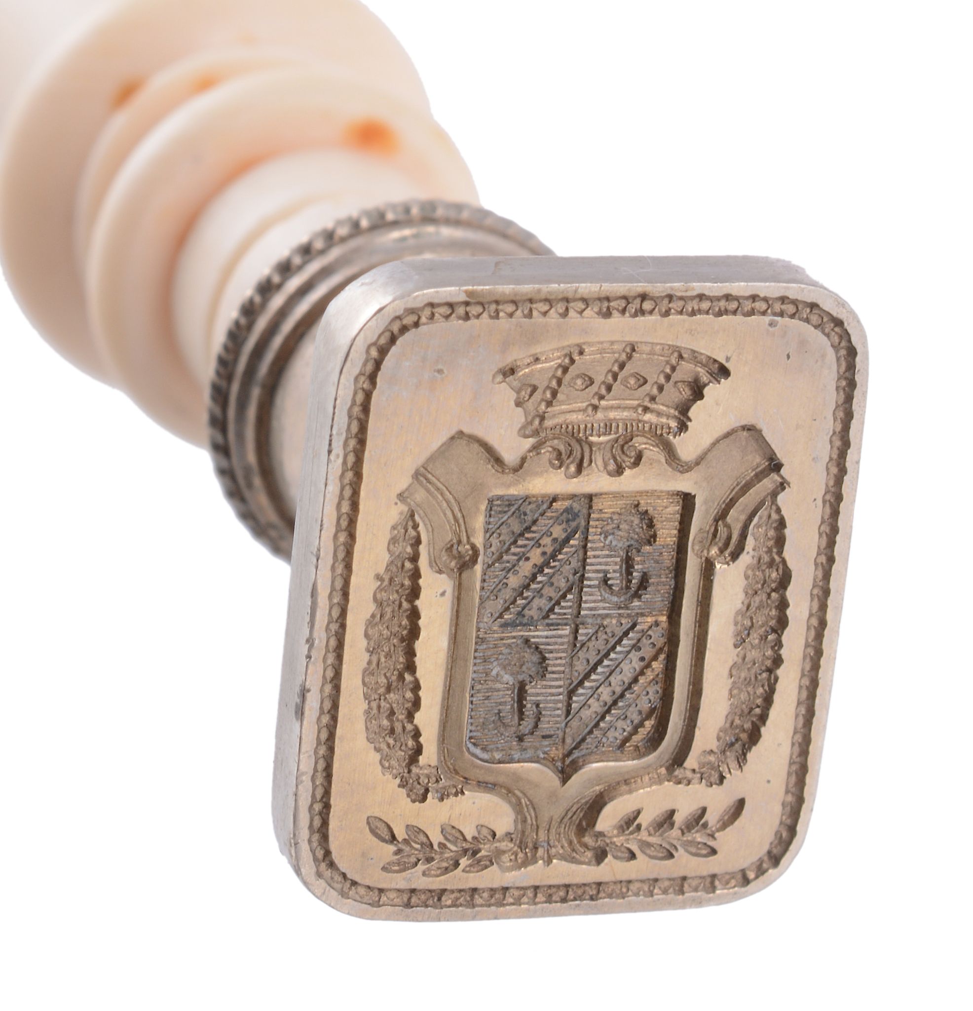 A Victorian turned ivory desk seal,   with a rounded tapering knop, with a white alloy head and - Image 2 of 2