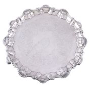 A George III silver shaped circular salver by Elizabeth Cooke,   London 1764, with a scroll and