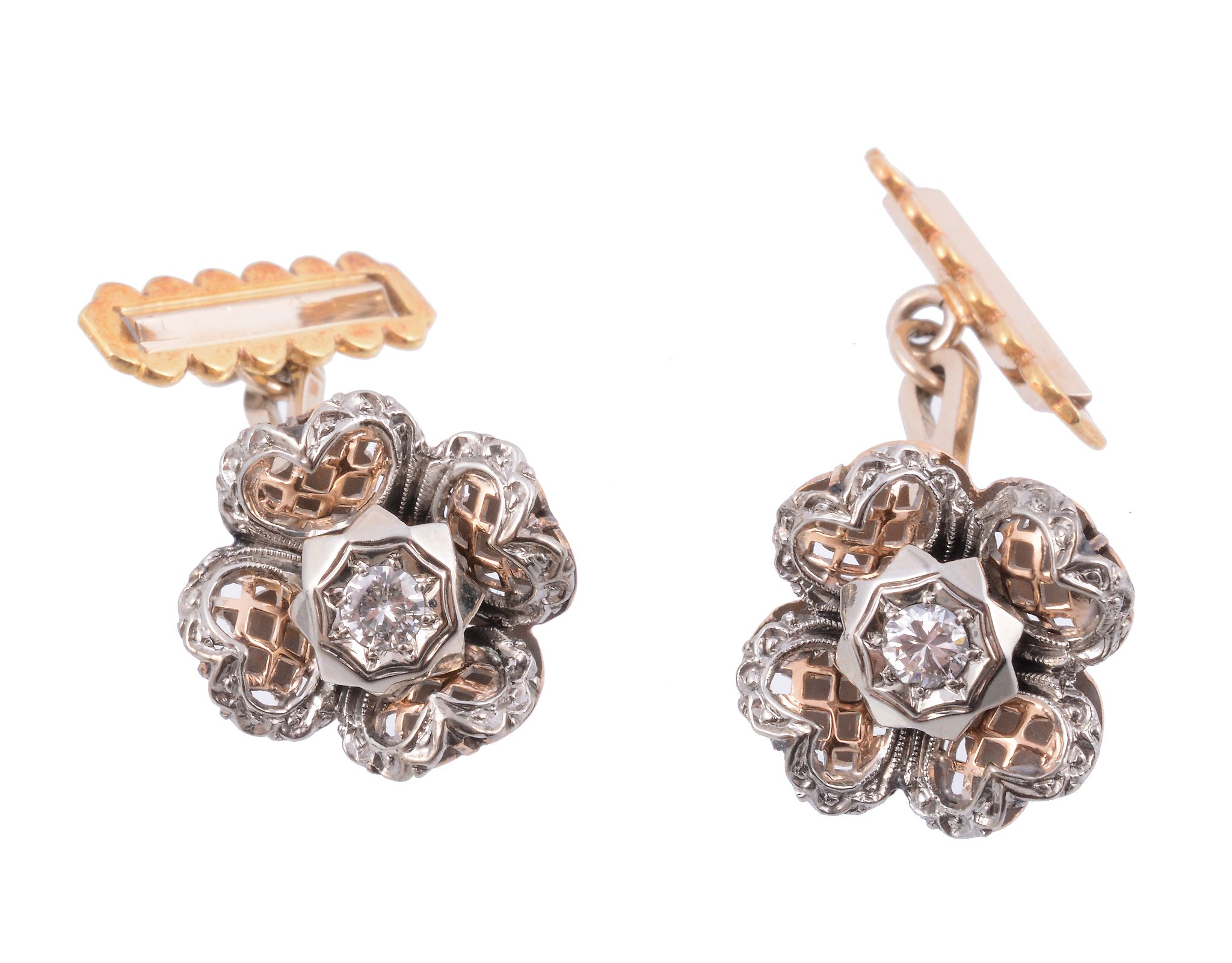 A pair of diamond flower head cufflinks  , the pierced two colour flower heads with a central