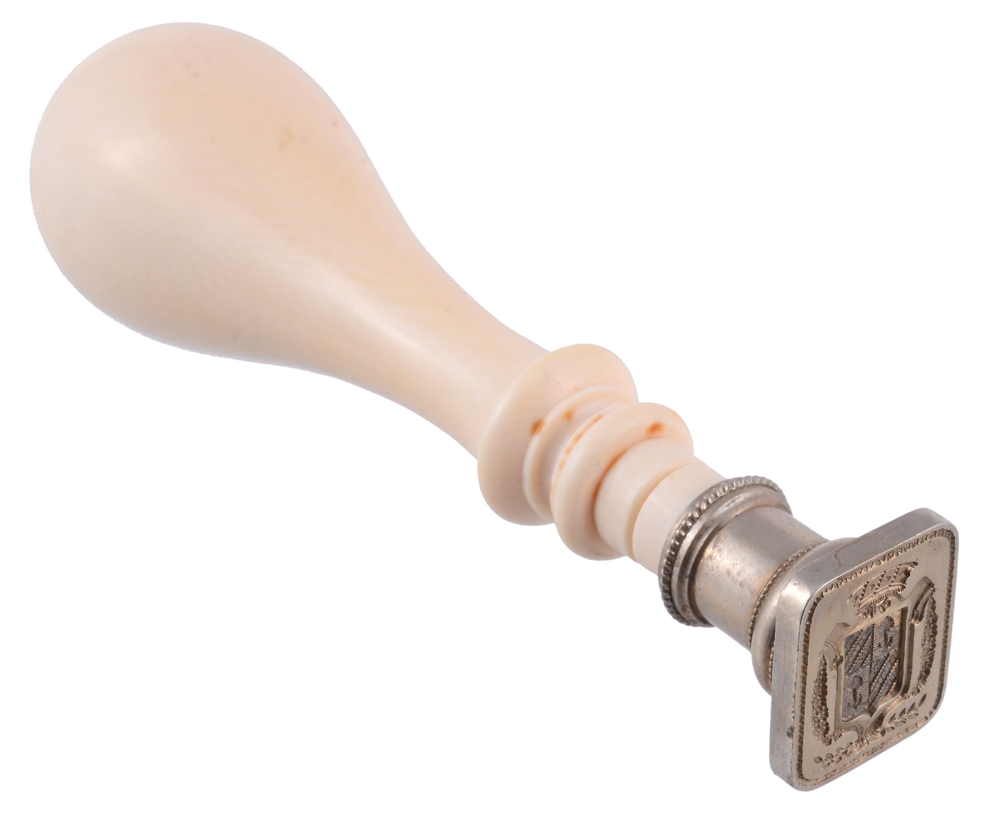 A Victorian turned ivory desk seal,   with a rounded tapering knop, with a white alloy head and