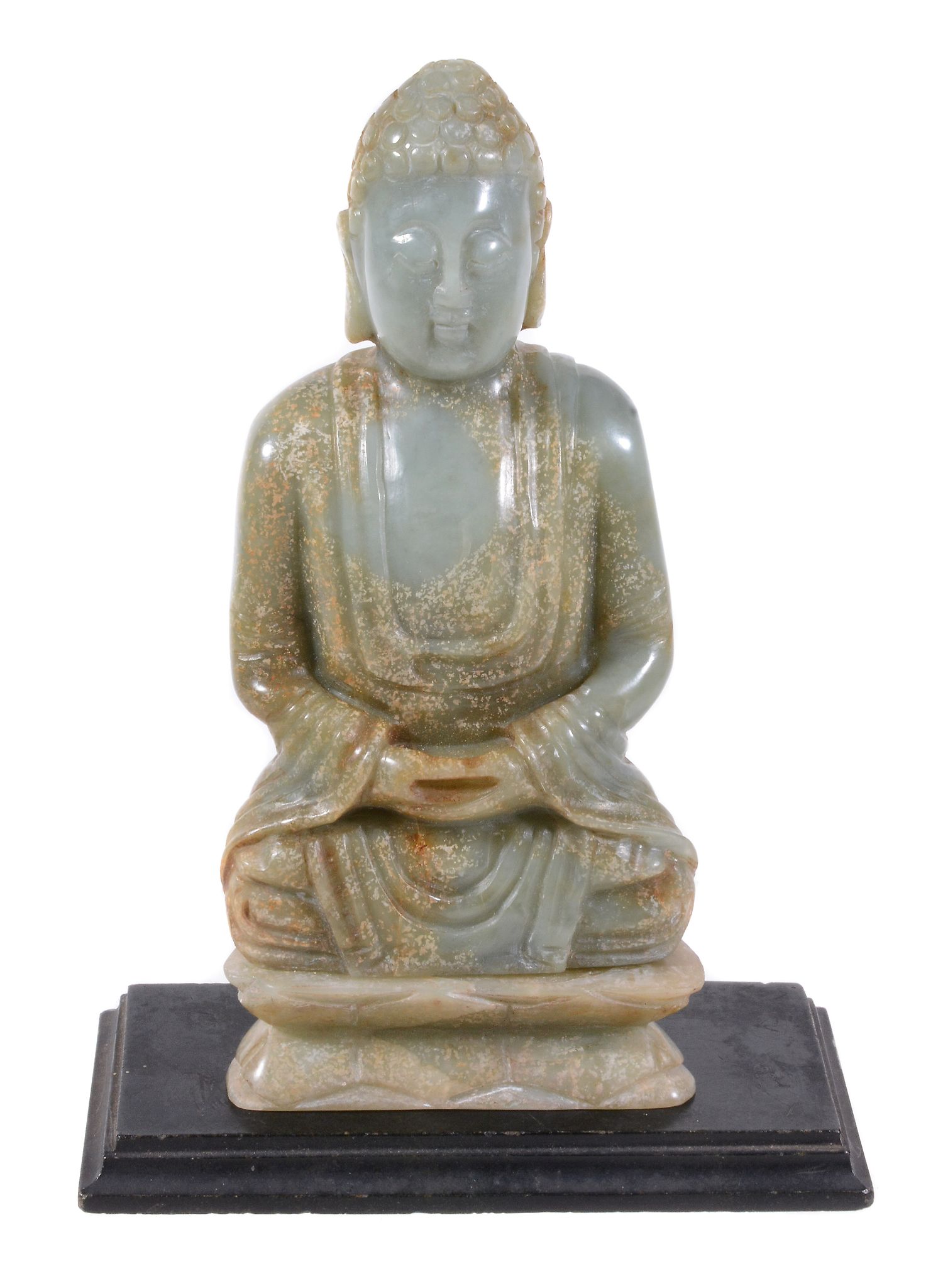 A Chinese green hardstone Buddha, on rectangular black stone base   A Chinese green hardstone