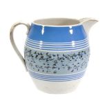A British pottery mocha ware jug, of so called 'Dutch' type   A British pottery mocha ware jug,   of