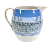 A British pottery mocha ware jug, of so called 'Dutch' type   A British pottery mocha ware jug,   of