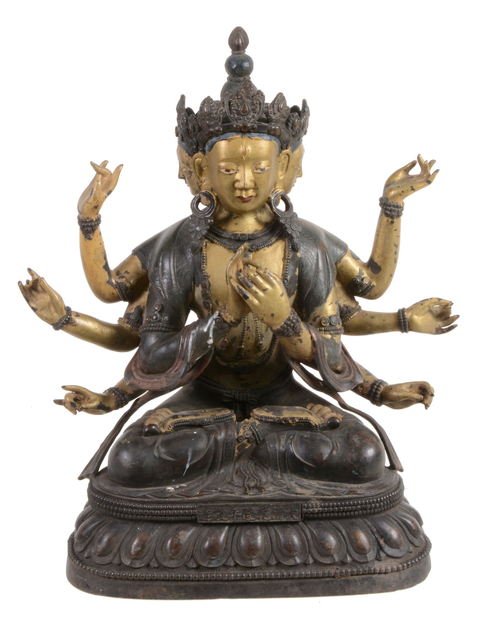 A Sino-Tibetan bronze seated multi-headed figure   A Sino-Tibetan bronze seated multi-headed figure,