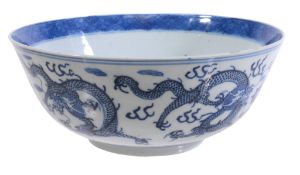 A Chinese blue and white dragon bowl, late 19th century   A Chinese blue and white dragon bowl,