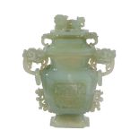A large Chinese jade vase and cover, 20th century   A large Chinese jade vase and cover, 20th