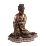 A Chinese bronze gold-splash model of Guanyin, seated with eyes downcast   A Chinese bronze gold-