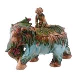 A Continental majolica tureen and cover modelled as an elephant and monkey...   A Continental