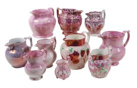 A selection of British pottery and pearlware pink-lustre jugs   A selection of British pottery and