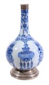 A Chinese blue and white bottle vase , Kangxi, with white metal mounts   A Chinese blue and white