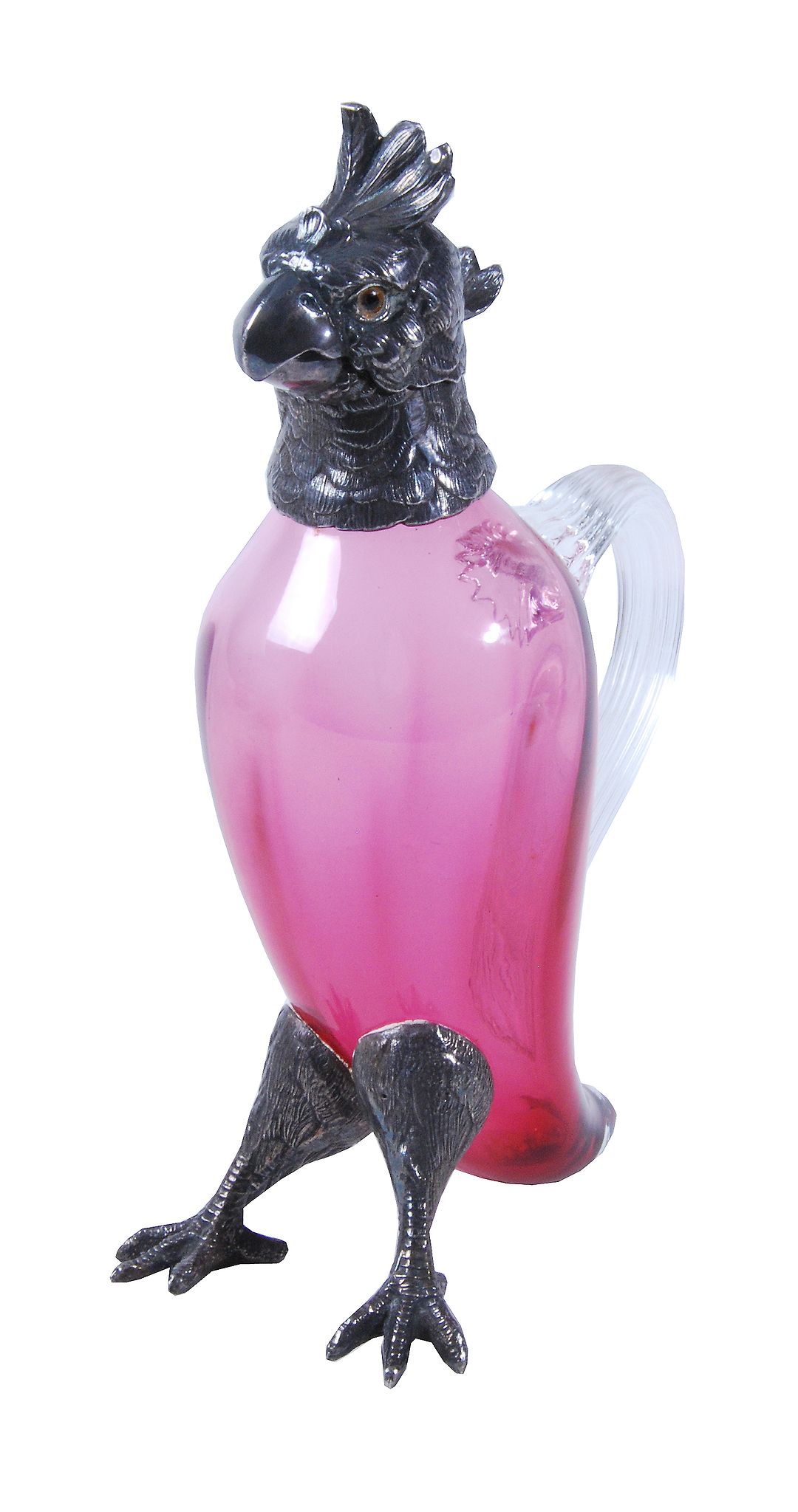 A cranberry and clear glass white-metal-mounted claret-jug modelled as a...   A cranberry and