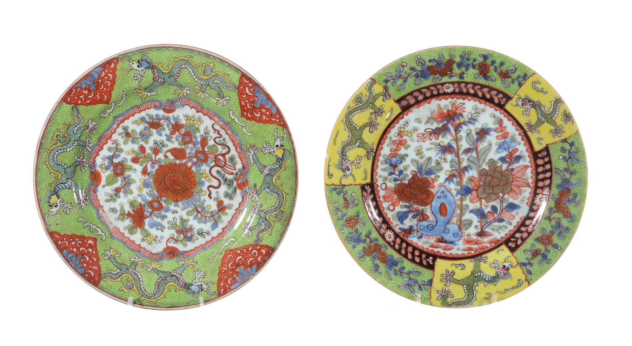 A pair of Chinese 'clobbered' plates, the porcelain Kangxi   A pair of Chinese 'clobbered' plates,