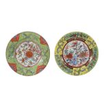 A pair of Chinese 'clobbered' plates, the porcelain Kangxi   A pair of Chinese 'clobbered' plates,