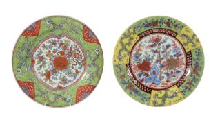 A pair of Chinese 'clobbered' plates, the porcelain Kangxi   A pair of Chinese 'clobbered' plates,