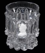 A Baccarat press-moulded glass tumbler with sulphide commemorative of...   A Baccarat press-