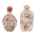 Two Interior Painted Glass Snuff Bottles, one with overlaid red reserves...   Two Interior Painted