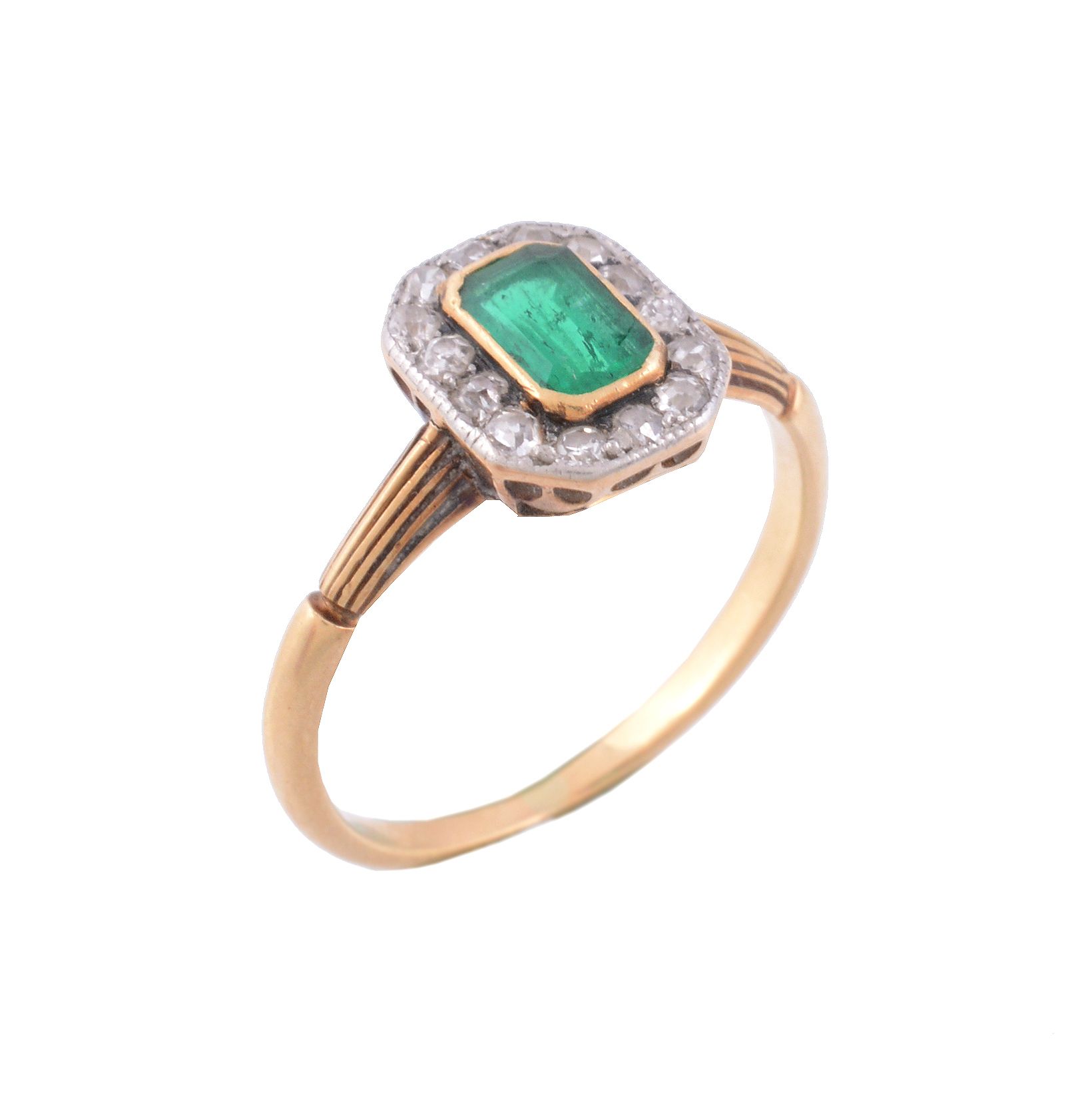 An emerald and diamond cluster ring , circa 1920   An emerald and diamond cluster ring  , circa