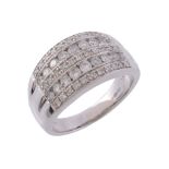 A diamond dress ring, set with five rows of brilliant cut diamonds, stamped 750   A diamond dress