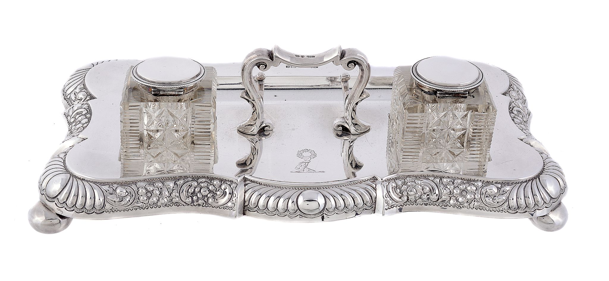 A late Victorian silver shaped oblong inkstand by James Dixon  &  Sons Ltd   A late Victorian silver